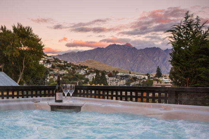 Outdooor jacuzzi and Queenstown views at The Dairy Outdooor jacuzzi and Queenstown views at The Dairy